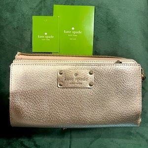 Authentic Kate Spade wristlet wallet in Rose Gold